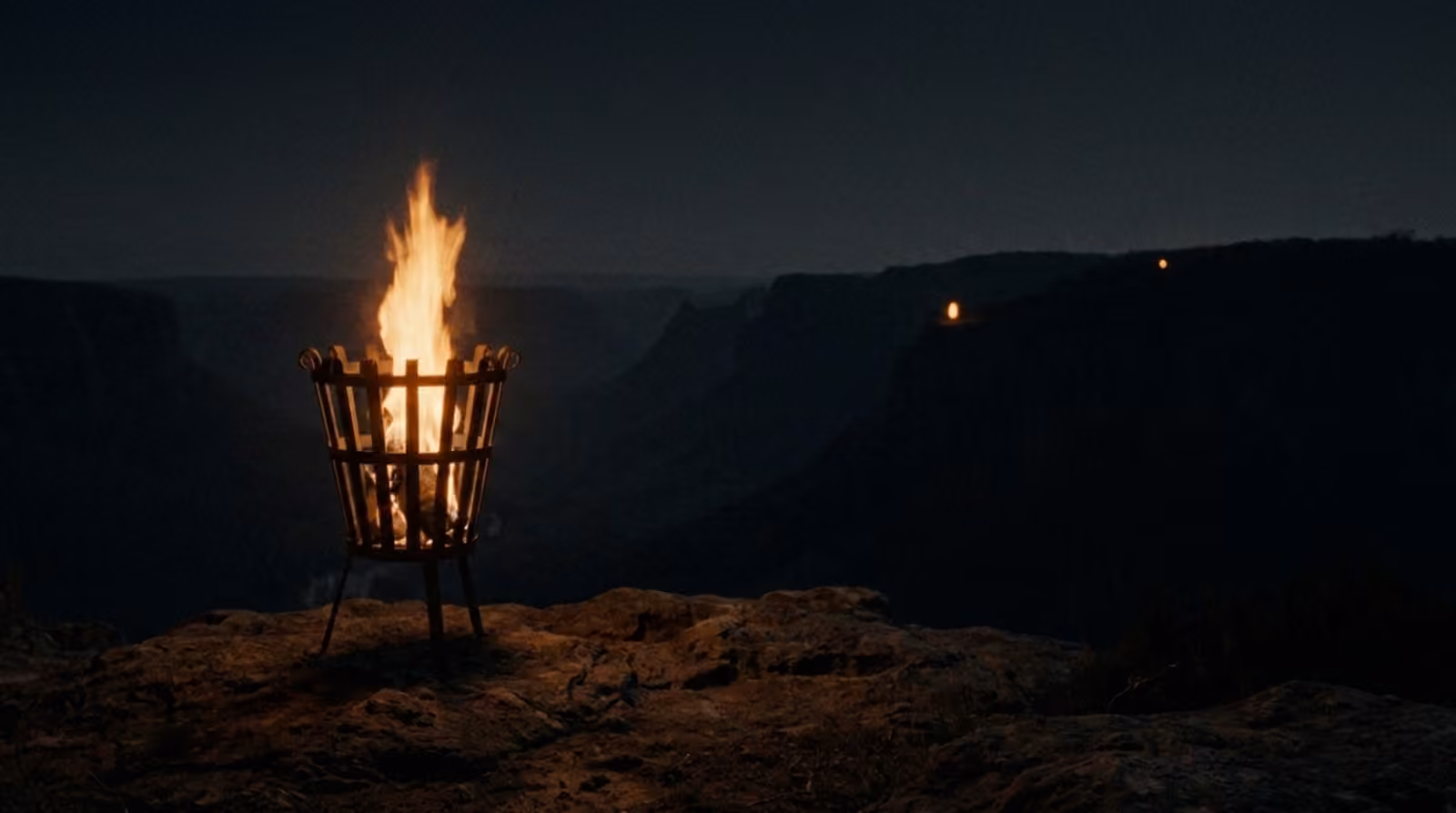 A second and third beacon answering across the valley ridgelines.